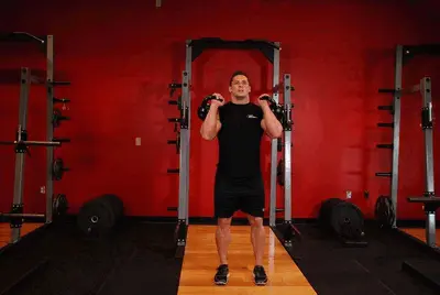 Animation of Double Kettlebell Push Press