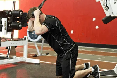 Animation of Kneeling Cable Crunch With Alternating Oblique Twists